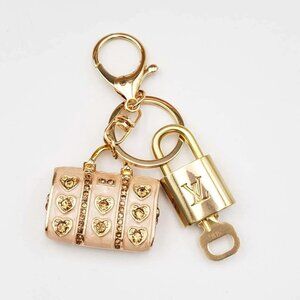 Authentic Louis Vuitton Lock & Key with unbranded White Bag Keycharm, Keychain